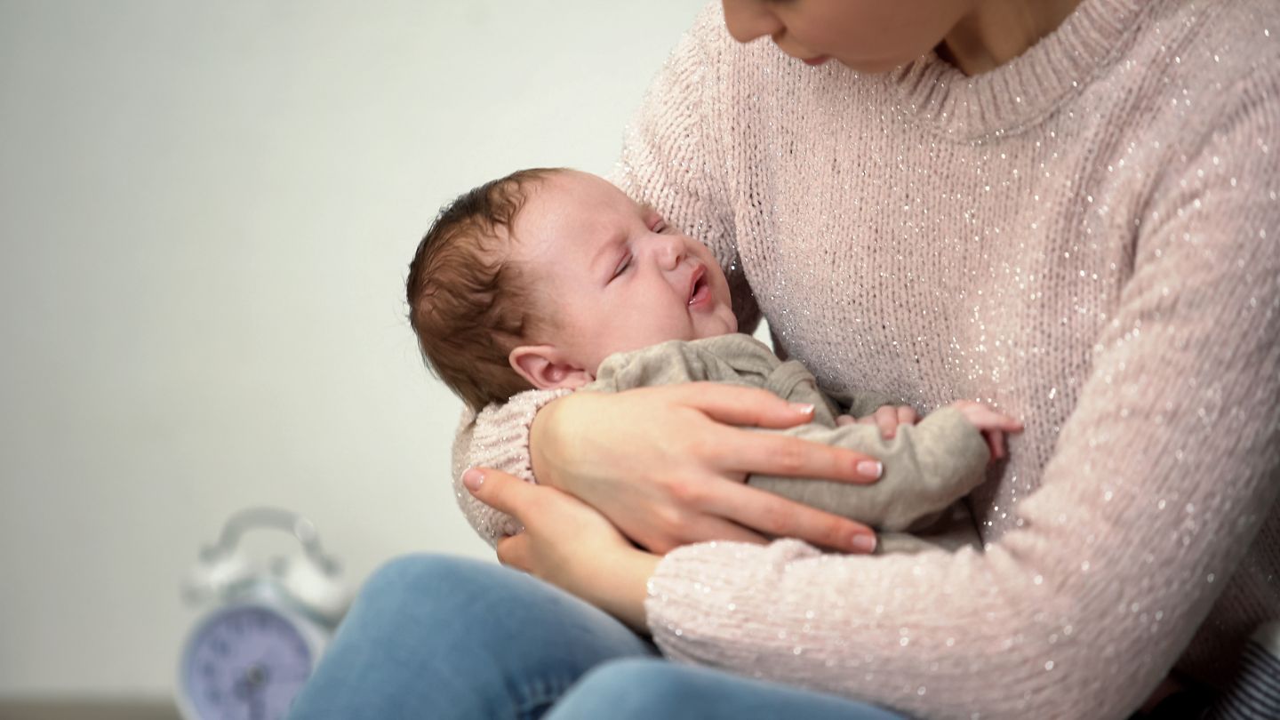 A Mother Holding Her Child