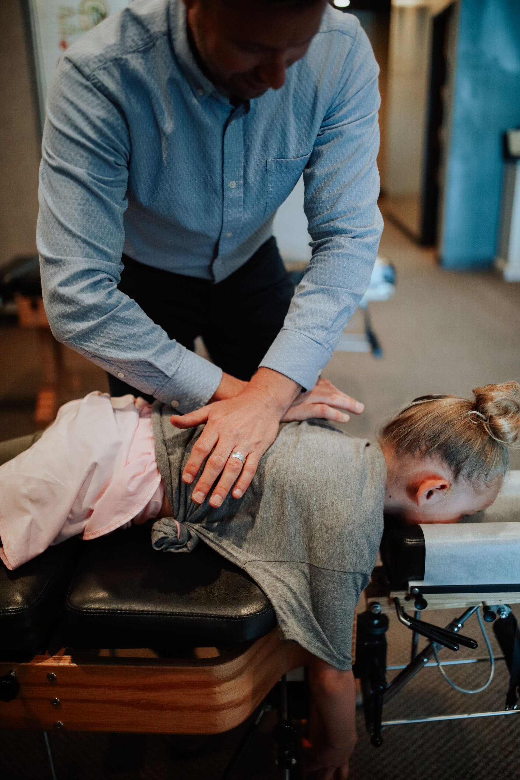 child-getting-chiropractic-adjustment